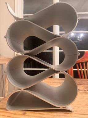 Echelon Wine Rack is a modular bottle storage system made from aluminum